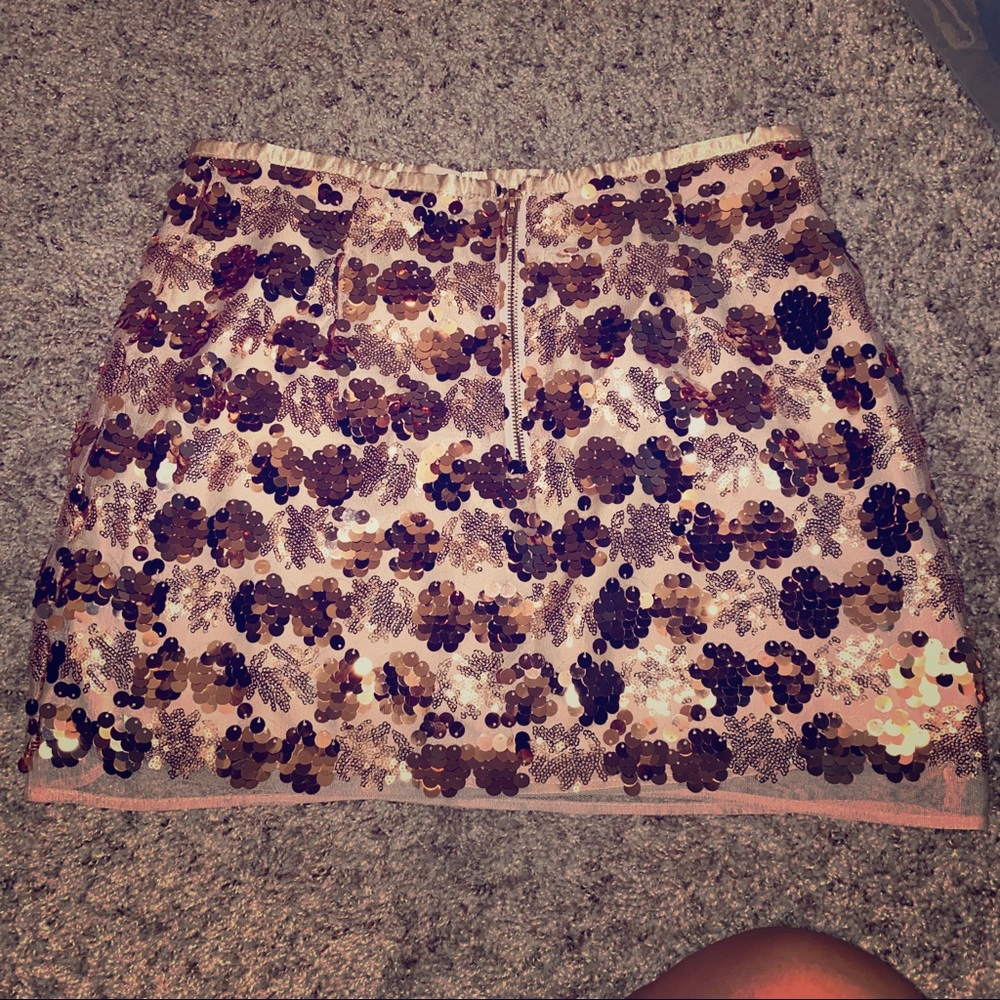 Gold shimmer skirt.
